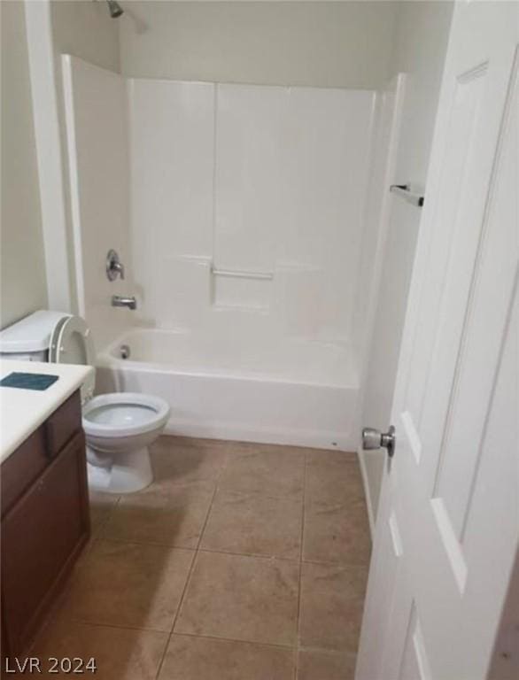 full bathroom with vanity, shower / bathing tub combination, tile patterned floors, and toilet