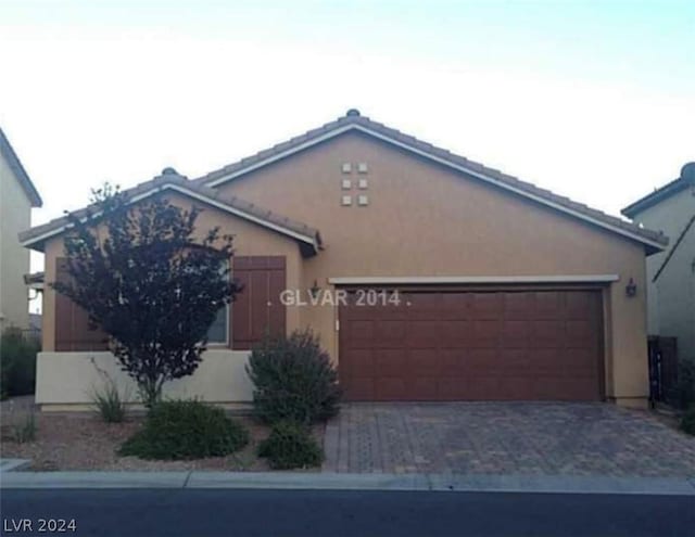 ranch-style house with a garage