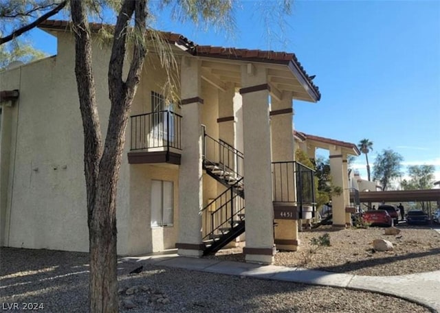 view of building exterior with a carport