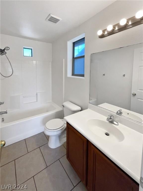 full bathroom with shower / washtub combination, toilet, tile patterned floors, and vanity