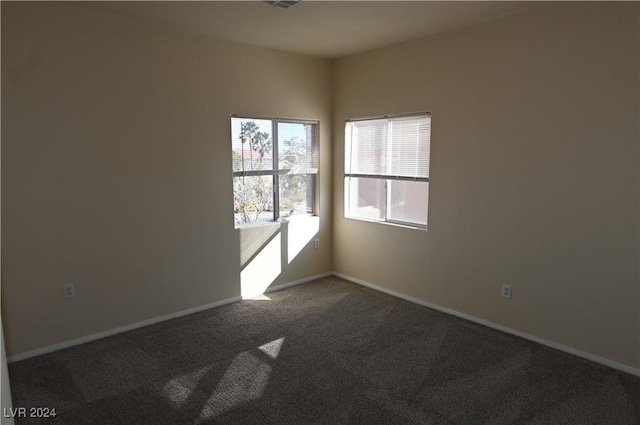 view of carpeted spare room