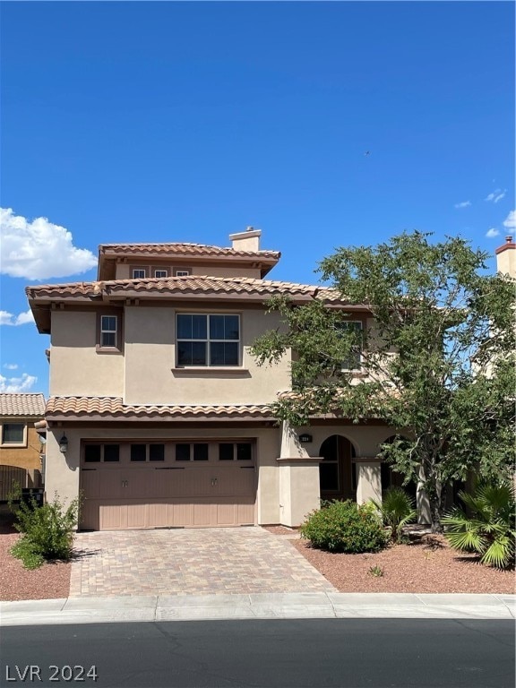 view of front of house with a garage