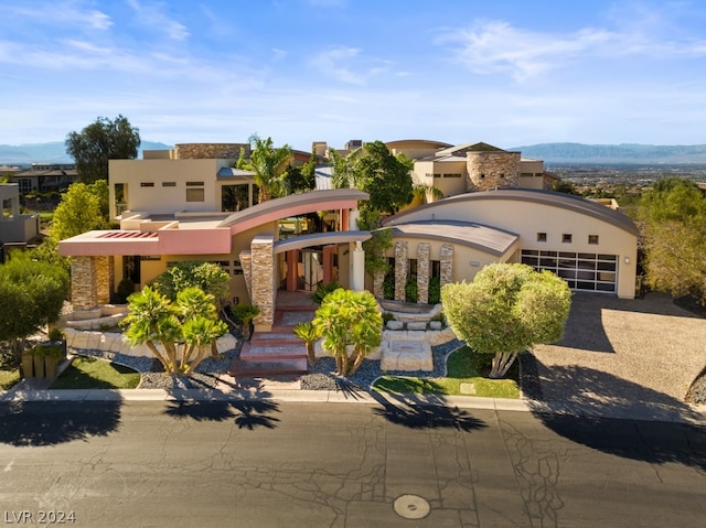 view of front of property with a mountain view