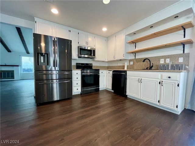 kitchen featuring white cabinetry, dark wood-type flooring, and black appliances