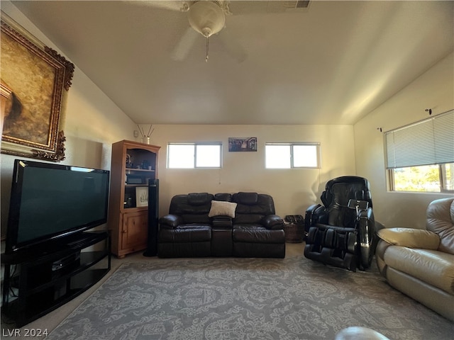 living room featuring carpet and ceiling fan