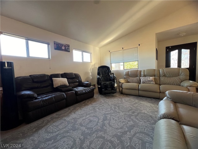 living room with vaulted ceiling and dark carpet