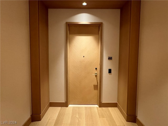 doorway featuring light wood-type flooring