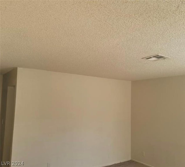 4300 N Lamont St Unit 232, Las Vegas, NV 89115 - empty room featuring carpet floors and a textured ceiling