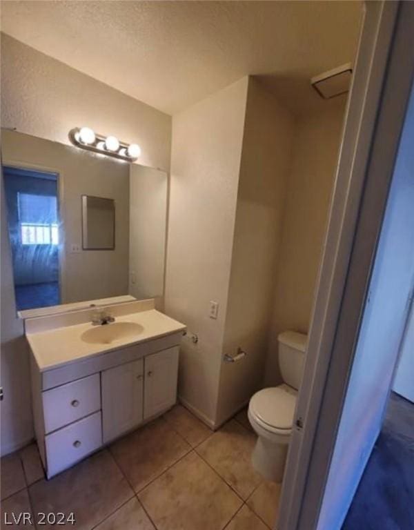 4300 N Lamont St Unit 232, Las Vegas, NV 89115 - bathroom with toilet, tile patterned flooring, and vanity