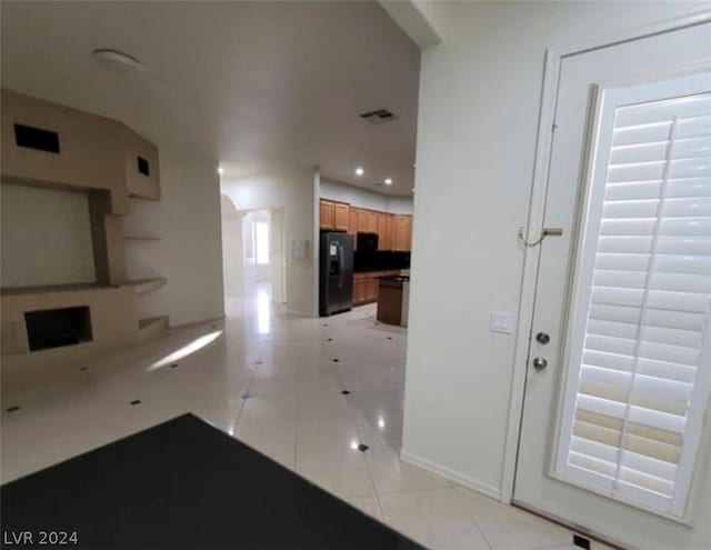 foyer with light tile patterned flooring