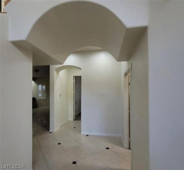 empty room featuring light tile patterned floors