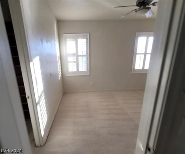 spare room featuring ceiling fan