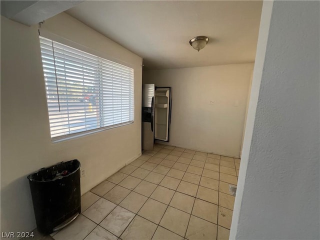 interior space featuring light tile patterned floors