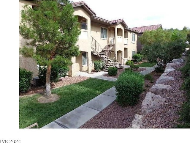 view of property's community with stairs