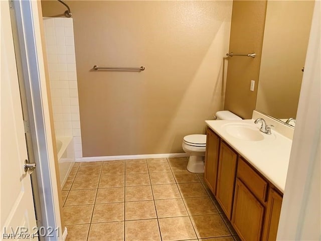 full bathroom with tile flooring, vanity, toilet, and shower / bathtub combination