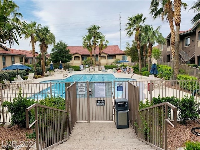 view of pool featuring a patio