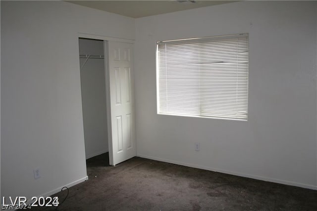 unfurnished bedroom with a closet