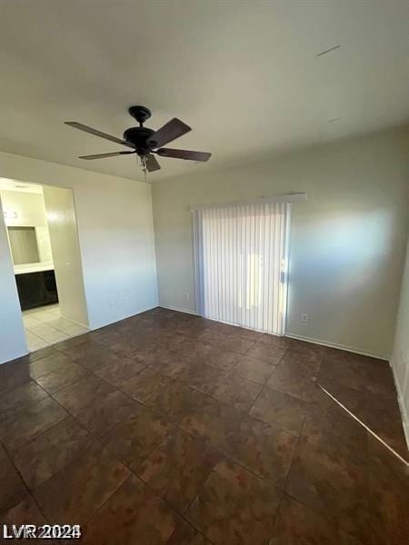 empty room featuring ceiling fan