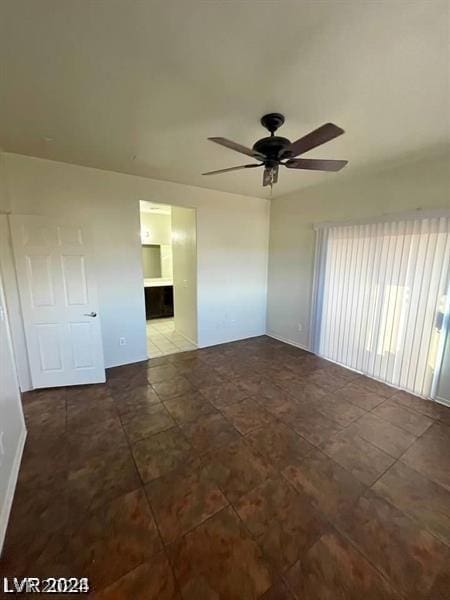 empty room featuring ceiling fan