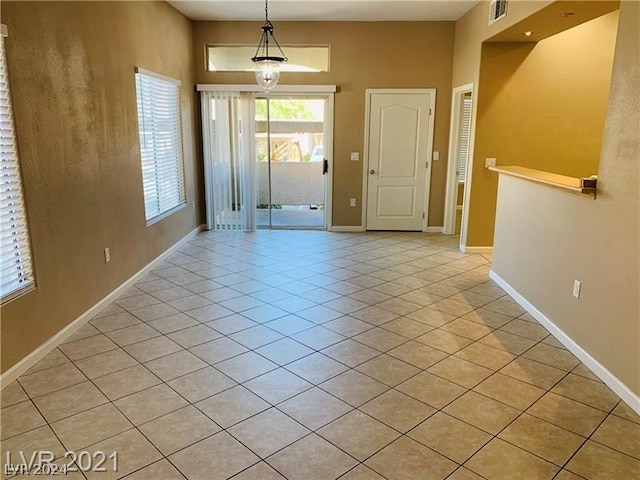 interior space featuring light tile floors