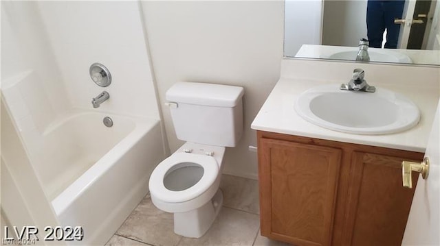 full bathroom featuring vanity, toilet,  shower combination, and tile patterned flooring