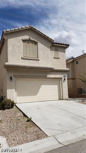 front facade with a garage