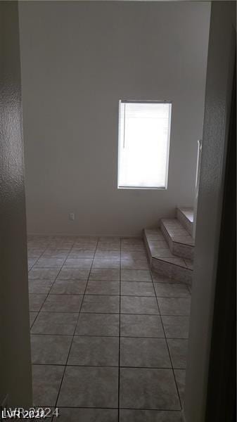 view of tiled spare room