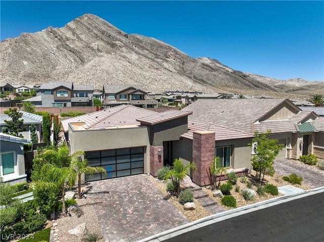 view of front of home featuring a mountain view