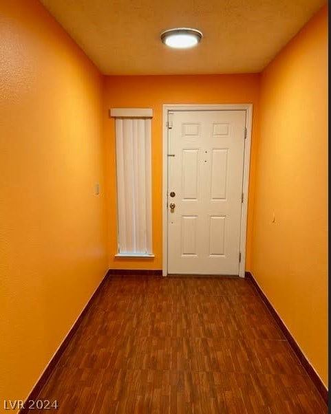 doorway to outside featuring hardwood / wood-style floors