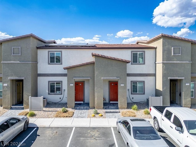 view of front of home with solar panels