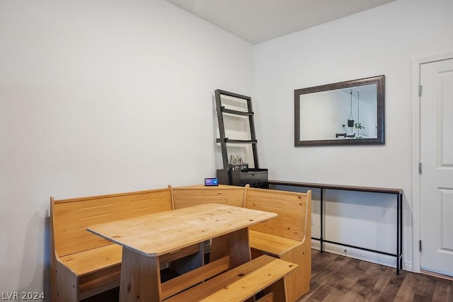 dining area featuring dark hardwood / wood-style flooring