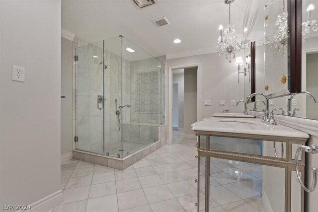 bathroom with tile patterned flooring, vanity, crown molding, and a shower with shower door