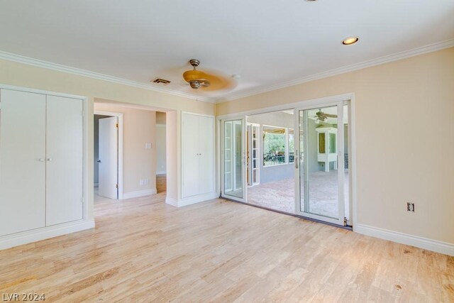 unfurnished bedroom featuring ceiling fan, crown molding, light hardwood / wood-style flooring, and access to exterior