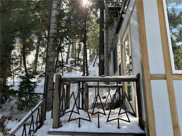 view of snow covered deck