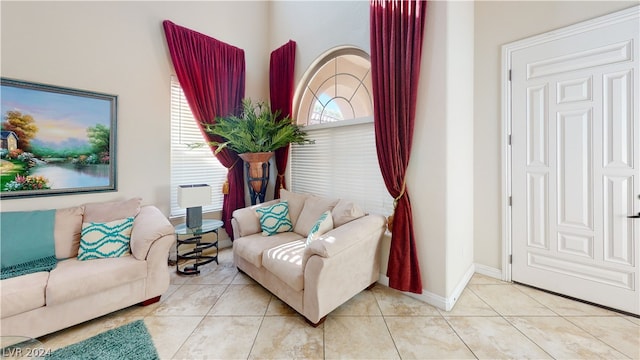 tiled living room featuring a wealth of natural light