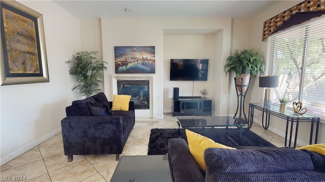 tiled living room with a healthy amount of sunlight