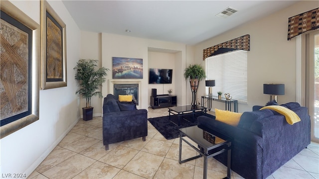 living room with light tile patterned flooring