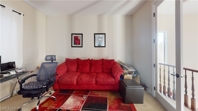 office featuring plenty of natural light and dark carpet