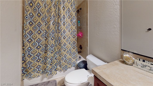 full bathroom with shower / bathtub combination with curtain, vanity, and toilet