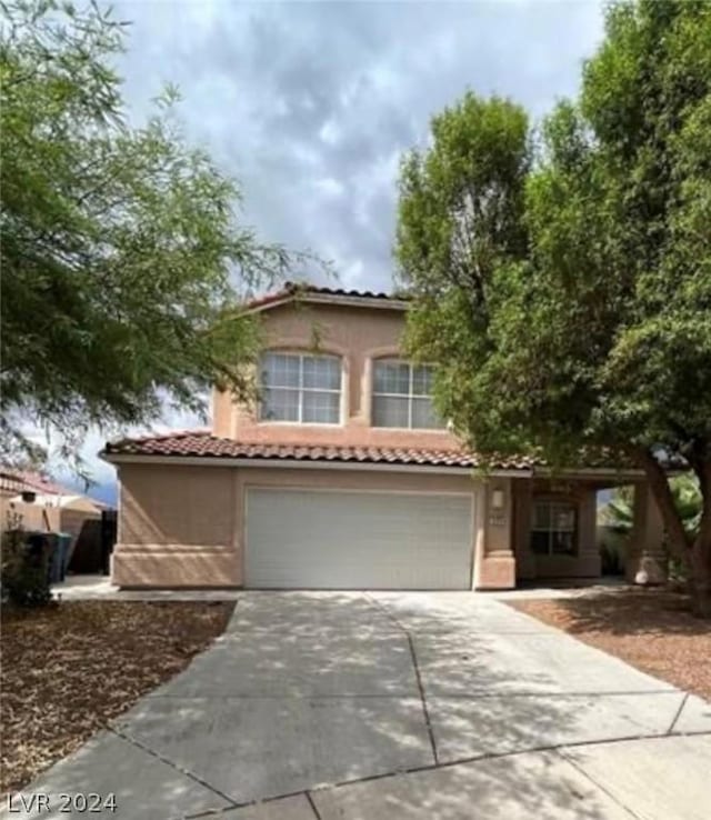 994 River Walk Ct, Henderson, NV 89015 - mediterranean / spanish house featuring a garage