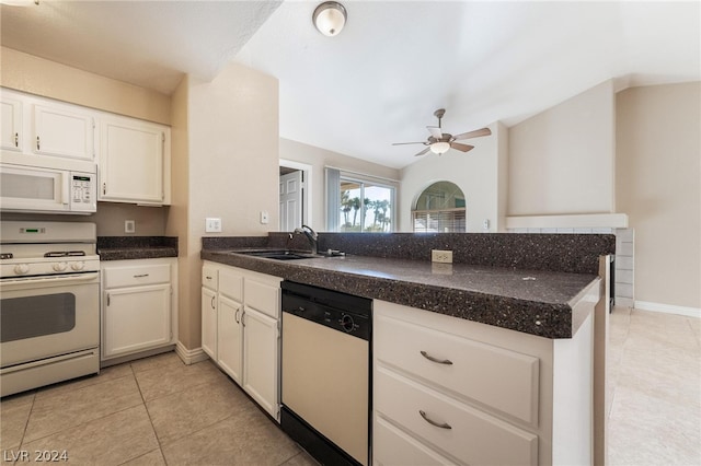 kitchen with white appliances, kitchen peninsula, light tile patterned floors, white cabinetry, and ceiling fan