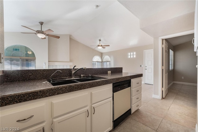 kitchen featuring white cabinetry, lofted ceiling, dishwasher, ceiling fan, and sink