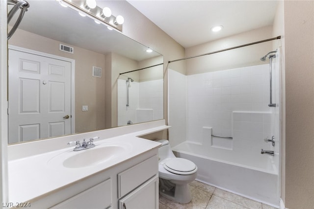 full bathroom with tile patterned floors, vanity, bathtub / shower combination, and toilet