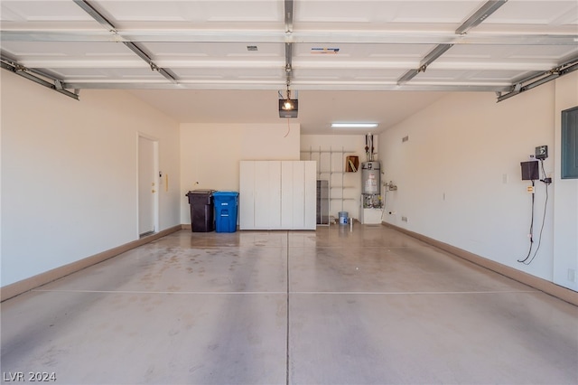 garage with secured water heater and a garage door opener