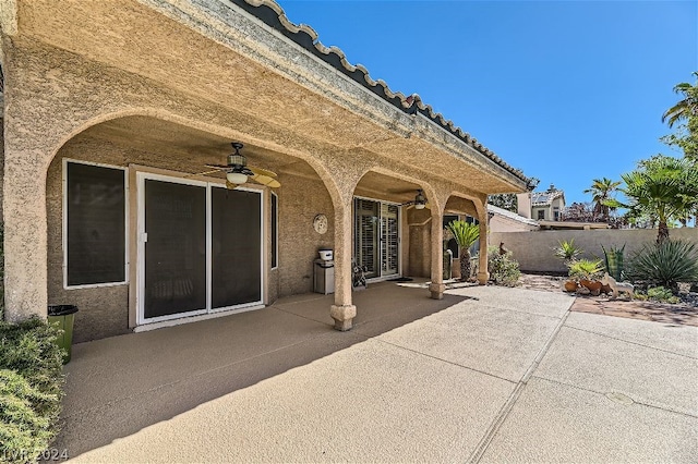 view of patio with ceiling fan