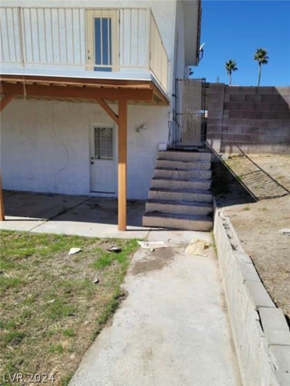 doorway to property with a deck