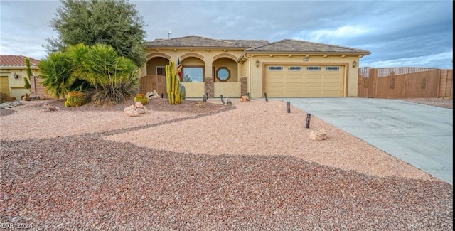 view of front of property featuring a garage