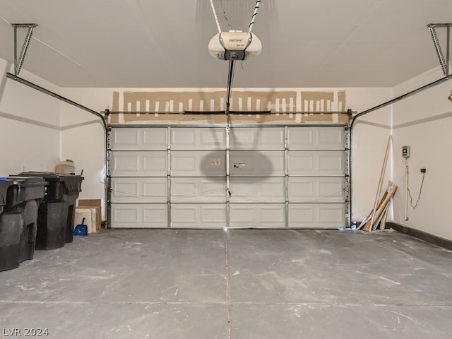 garage featuring a garage door opener