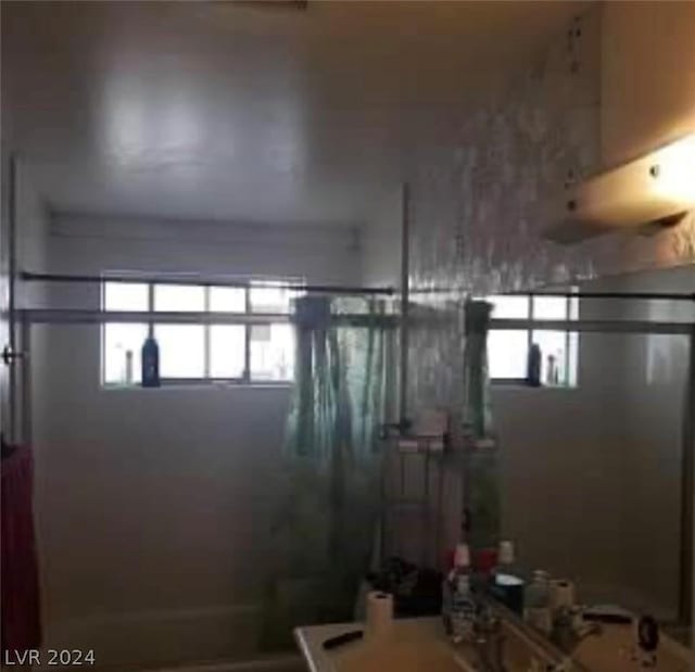 interior space with a shower with curtain