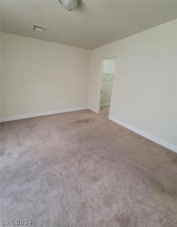 unfurnished room with carpet